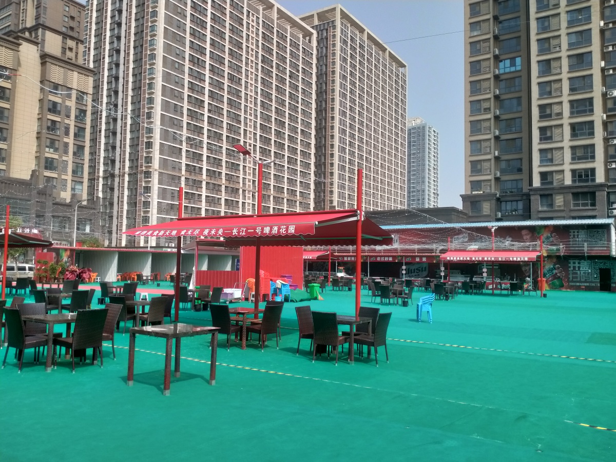 郑州二七区这个规划的停车场变身夜市？办事处介入调查